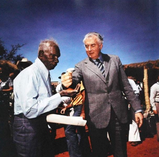 1975: Gough Whitlam places soil into Vincent Lingiari’s hands to mark the return of Wave Hill Station to the Gurindji people