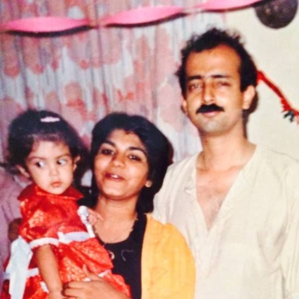 A Childhood Picture of Rhea Chakraborty With Her Parents