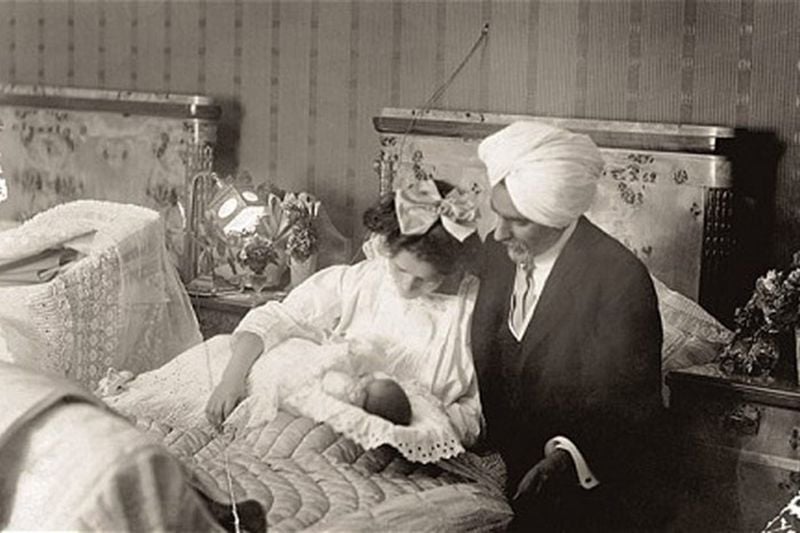 A Photograph of Newborn Amrita with her Parents