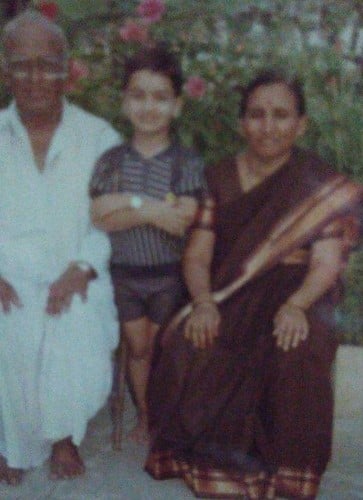 A blurred childhood photo of Pentala Harikrishna with his grandparents