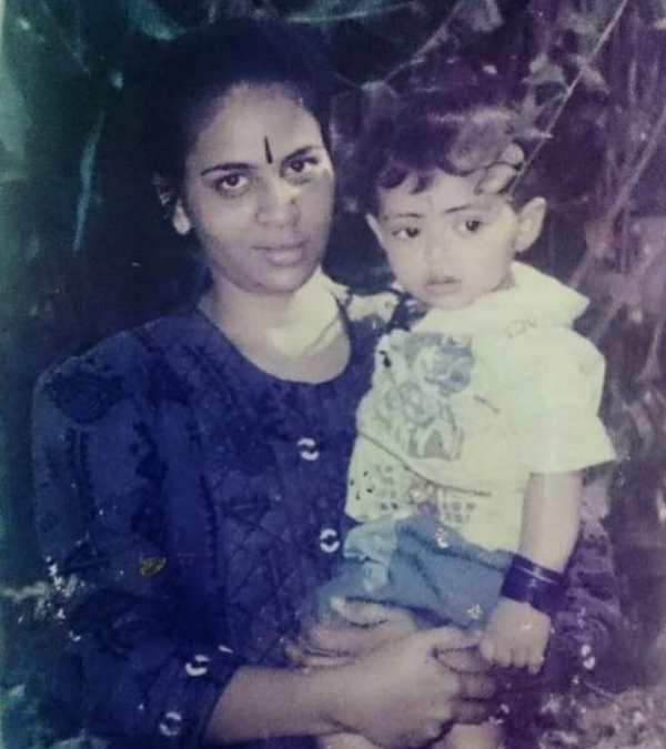 A childhood image of Arundhathi Nair with her mother