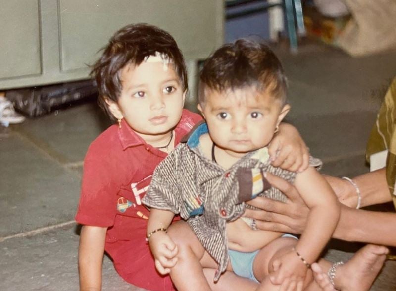 A childhood image of Prajakta Mali with her brother