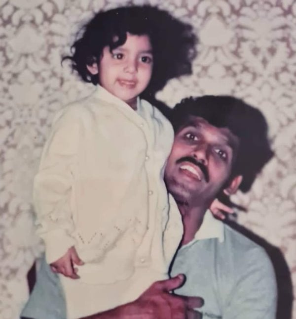 A childhood image of Urmilla Kanetkar Kothare with her father