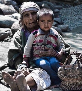 A childhood photo of Amir Hussain Lone with his grandmother