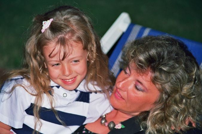 A childhood photo of Elena Barolo with her mother