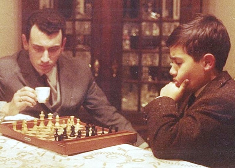 A childhood photo of Guterres with his family member while he was playing chess