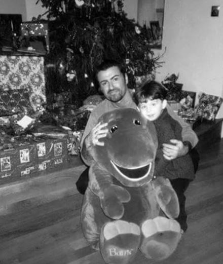 A childhood photo of James Kennedy with his godfather, George Michael