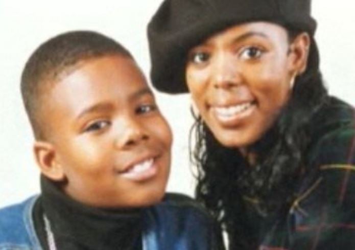 A childhood photo of Mario with his mother