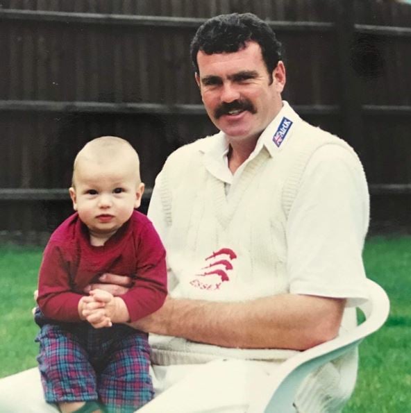 A childhood photo of Reece Topley with his father