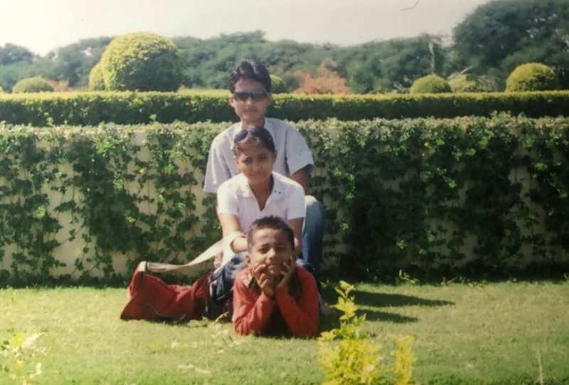 A childhood photo of Rohit Paudel with his siblings