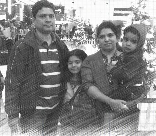 A childhood photo of Sharmishta Panoli with her family