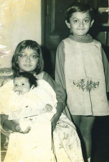 A childhood photo of Shoma Sen (wearing spectacles) with her siblings