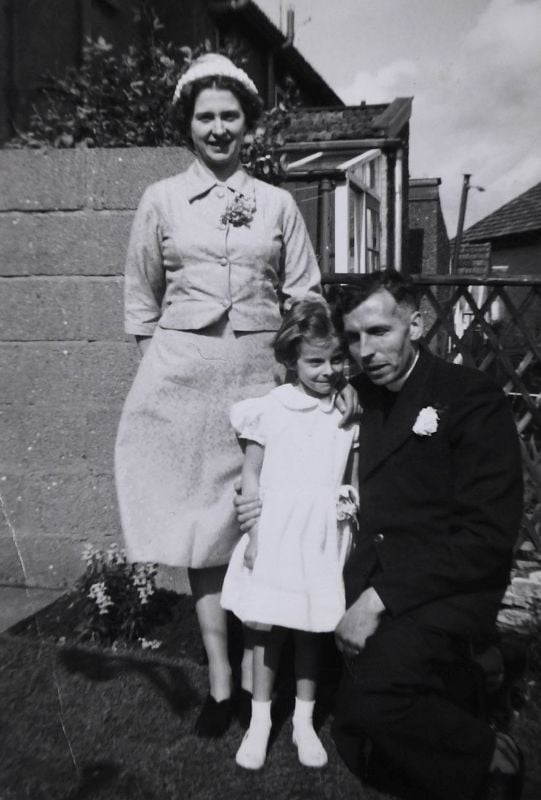 A childhood photo of Theresa May with her parents