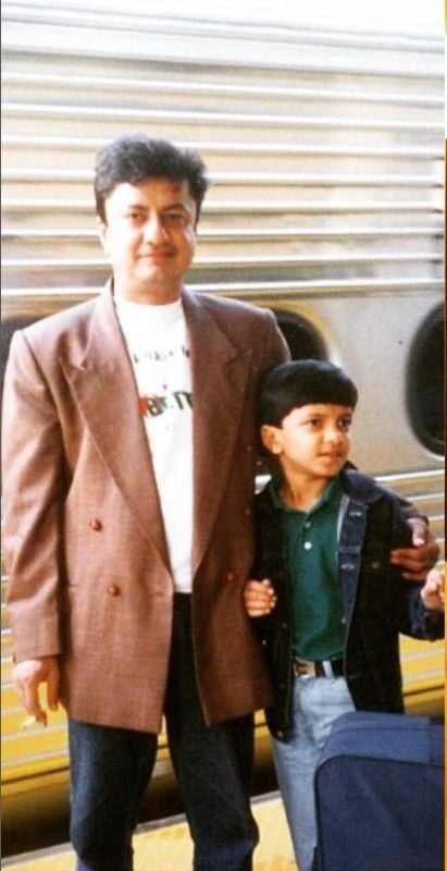 A childhood photograph of Charit Desai with his father