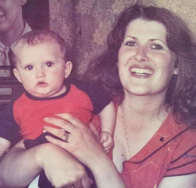 A childhood picture of Alaudin Hamiti with his mother captured in 1981