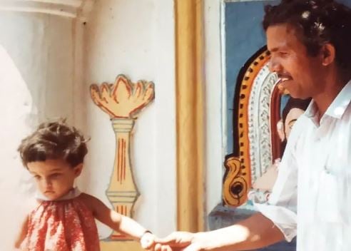 A childhood picture of Apurva Nemlekar with her father