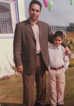 A childhood picture of Harman Virk with his father