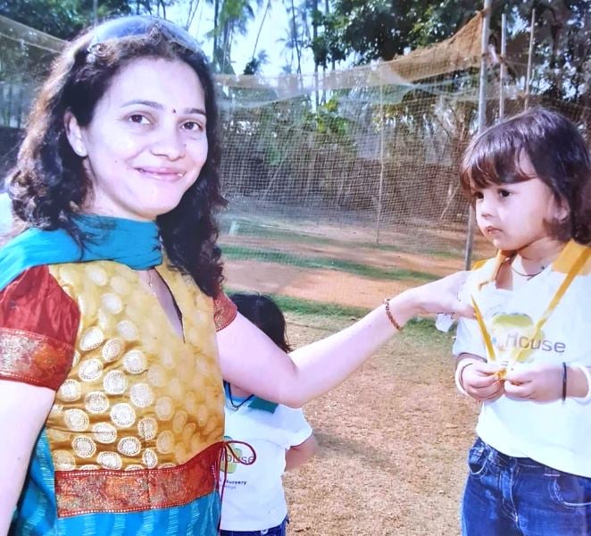 A childhood picture of Hurley Gala receiving medal after her first race in which she stood first