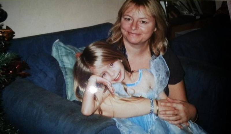 A childhood picture of Imogen Faith Reid with her mother