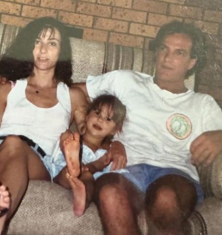 A childhood picture of Karina Irby with her parents