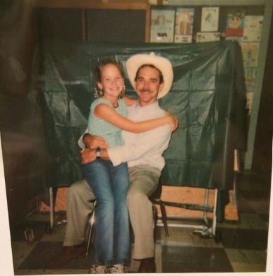 A childhood picture of Kelley Jakle with her father