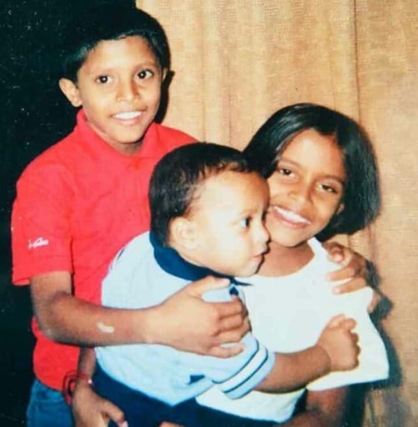 A childhood picture of Kusal Mendis (in red)