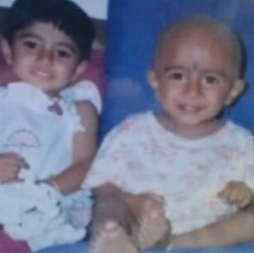 A childhood picture of Kushee Ravi with her brother