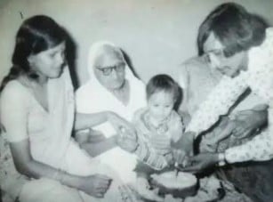 A childhood picture of Mahamandaleshwar Hemangi Sakhi with her parents and grandmother