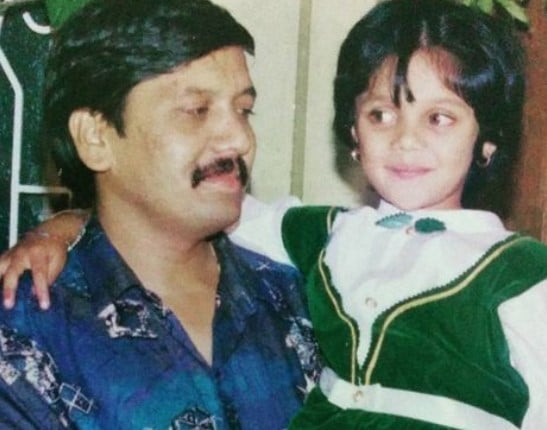 A childhood picture of Milana Nagaraj with her father