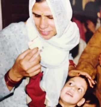 A childhood picture of Mohit Chhikara with his mother