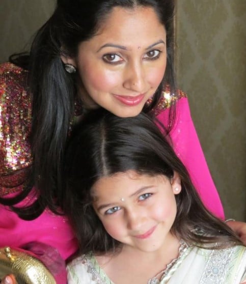 A childhood picture of Naomika Saran with her mother