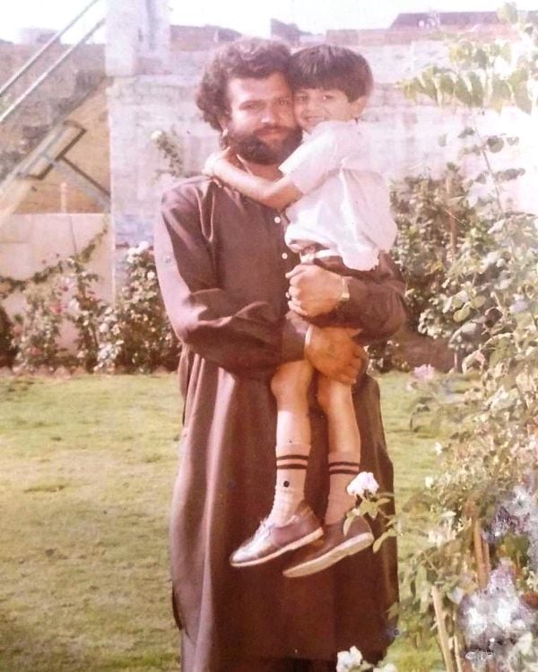 A childhood picture of Navraj Hans with his father