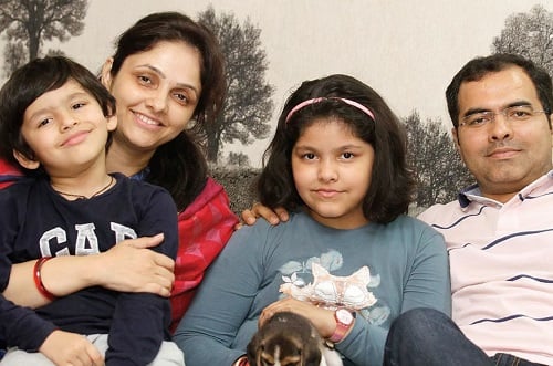 A childhood picture of Shiven Singh with his parents and sister