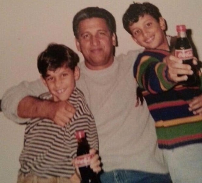 A childhood picture of Shan Masood with his father and brother