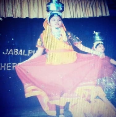 A childhood picture of Sonakshi Verma while doing garba dance at school