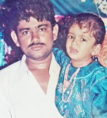A childhood picture of Soundariya Nanjundan with her father