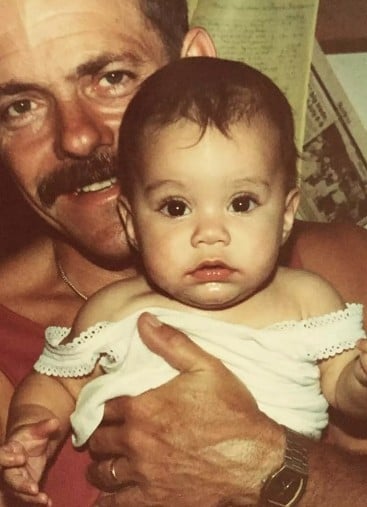 A childhood picture of Vanessa Hudgens with her father