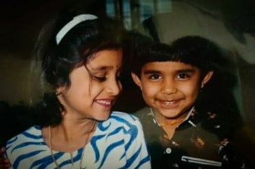A childhood picture of Yashmi Gowda (left)