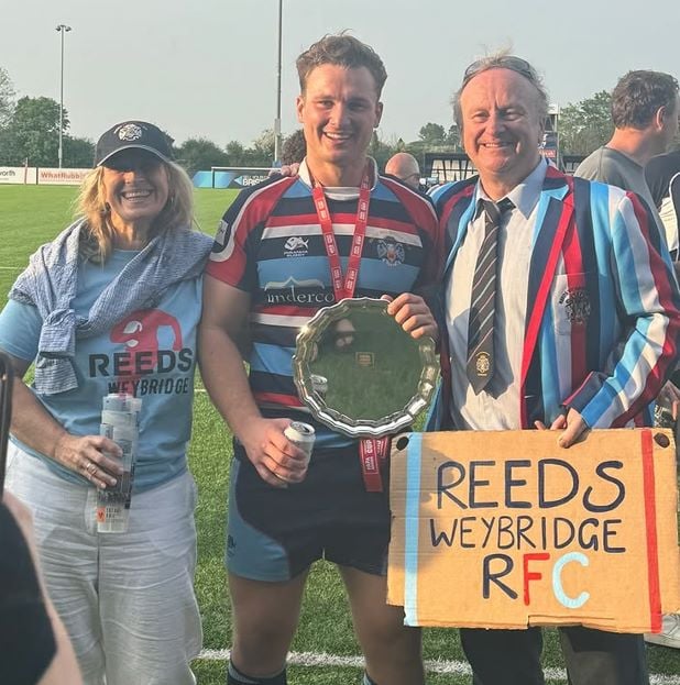 Chuggs Wallis holding a silver shield after winning a rugby match (2025)