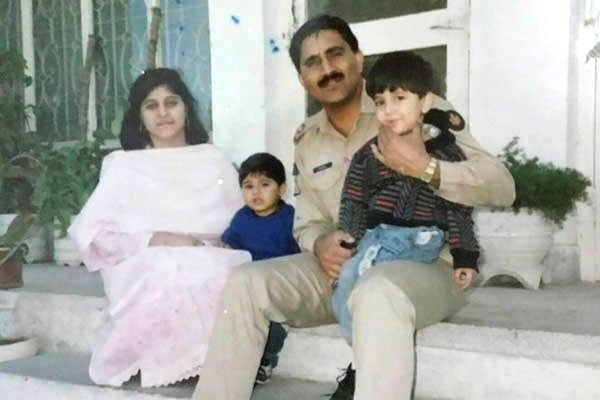 A photo of General Bajwa with his wife and sons taken when he was a young major