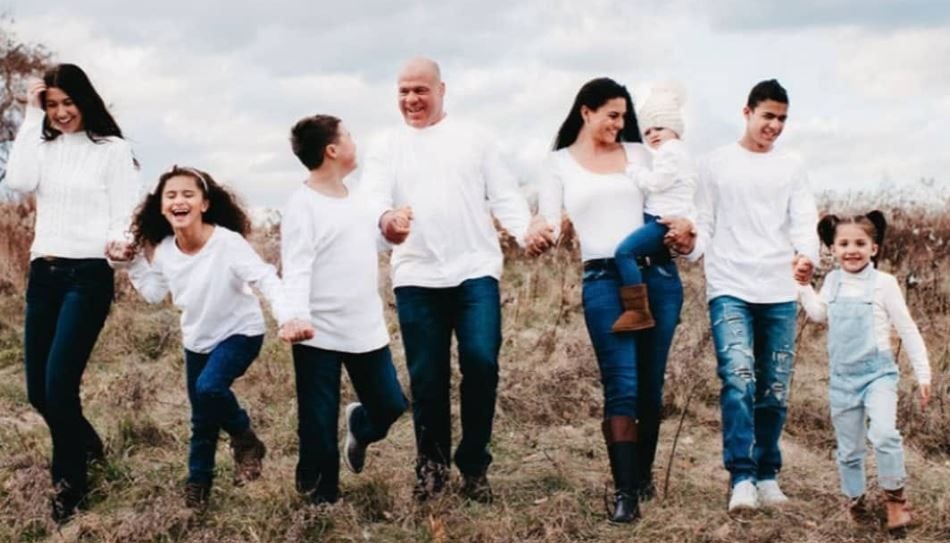 A photo of Giovanna Yannotti Angle with her husband, Kurt Angle, and children