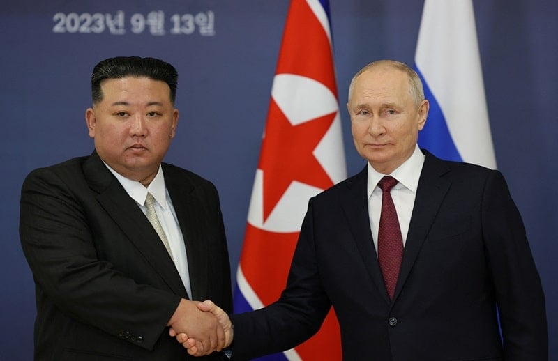 A photo of Kim Jong-un with President Putin