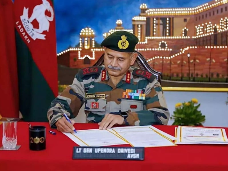 A photo of Lt Gen Upendra Dwivedi taken while he was signing a document after he became the Colonel of the Jammu and Kashmir Rifles and the Laddakh Scouts