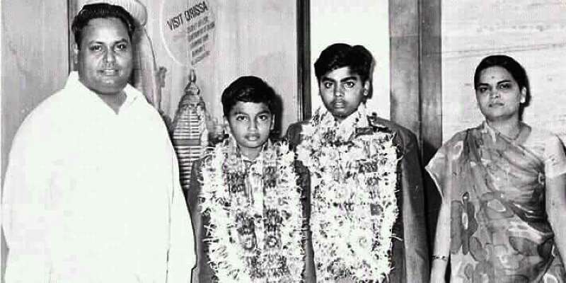 A photo of Mukesh Ambani (second from the right) with his parents and brother during his teen years