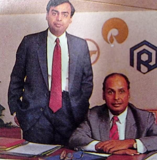 A photo of Mukesh Ambani with his father taken in the office
