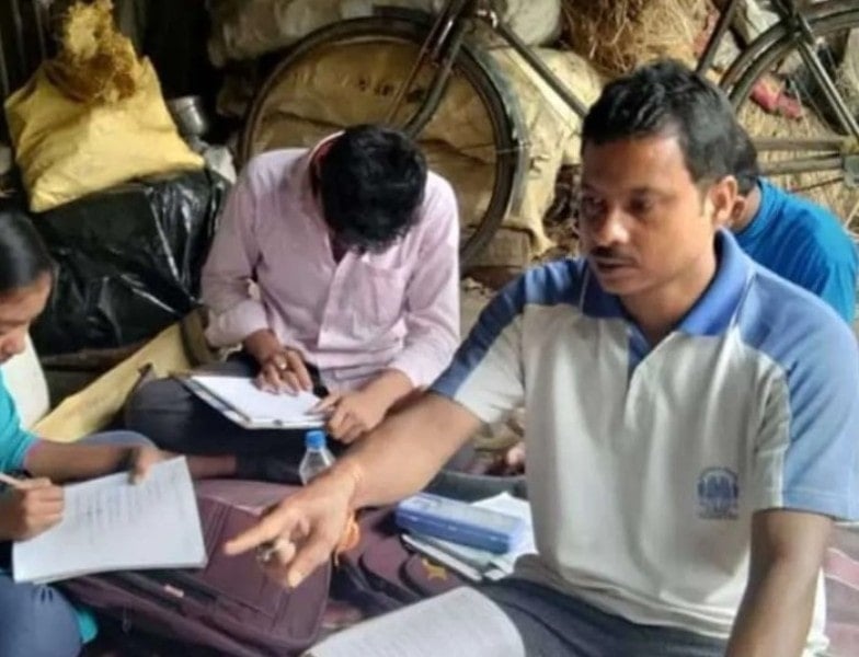 A photo of Nirmal taken while he was teaching students English