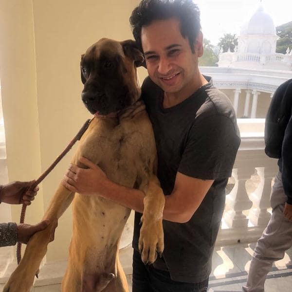 A photo of Pradyot with his pet dog