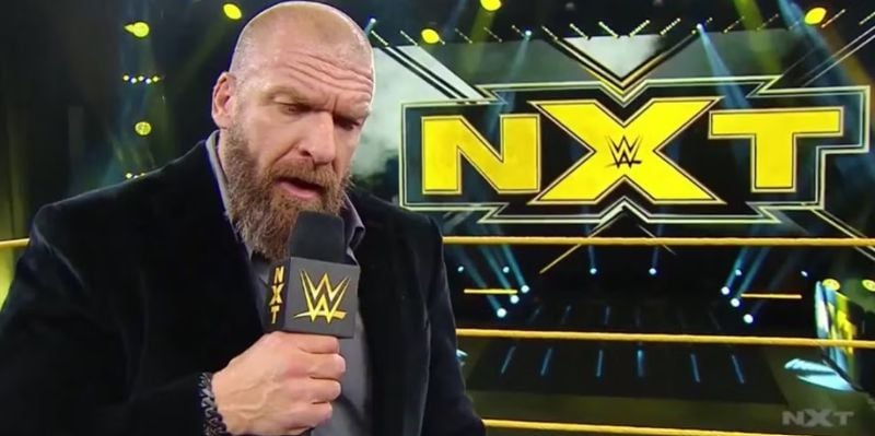 A photo of Triple H taken while he was making an announcement at NXT