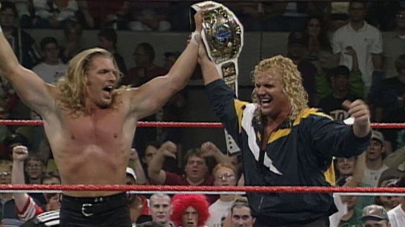A photo of Triple H taken with Mr. Perfect after he won the Intercontinental Championship title after defeating Marc Mero