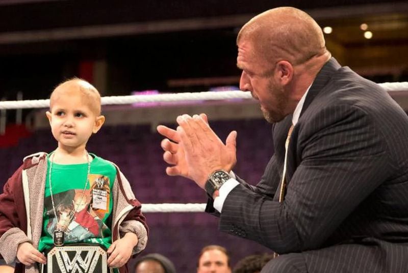 A photo of Triple H with Connor Michalek